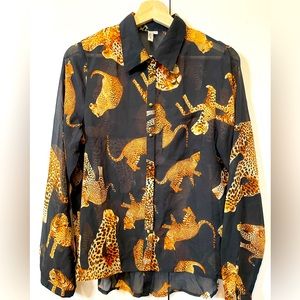 Women’s blouse in cheetah print size L